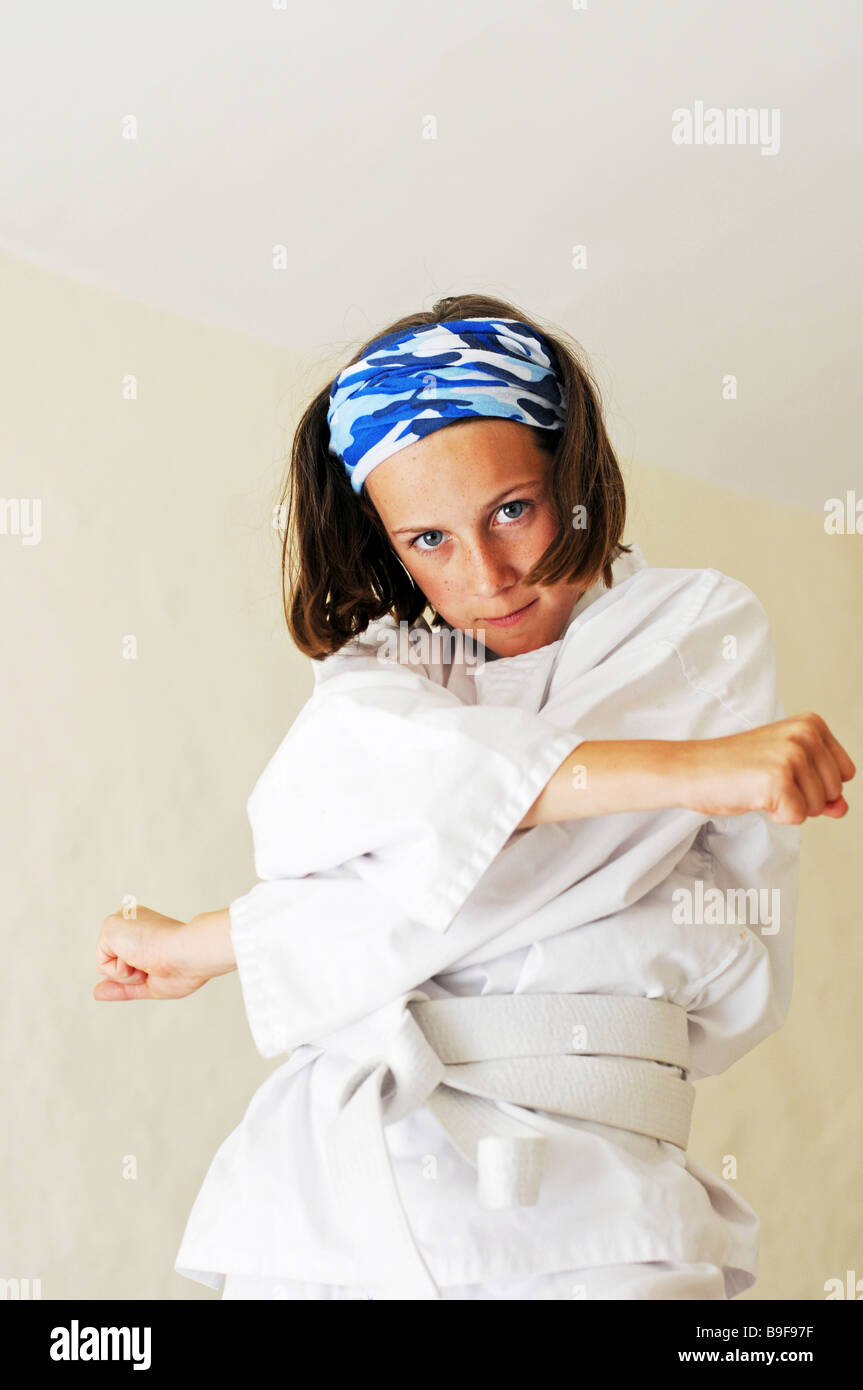indoor portrait of girl doing martial arts Stock Photo