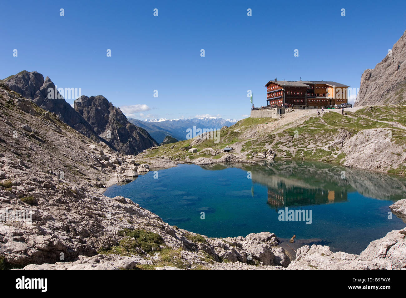 Reflection of building in lake Lienzer Dolomiten Lienz Tyrol Austria Stock Photo