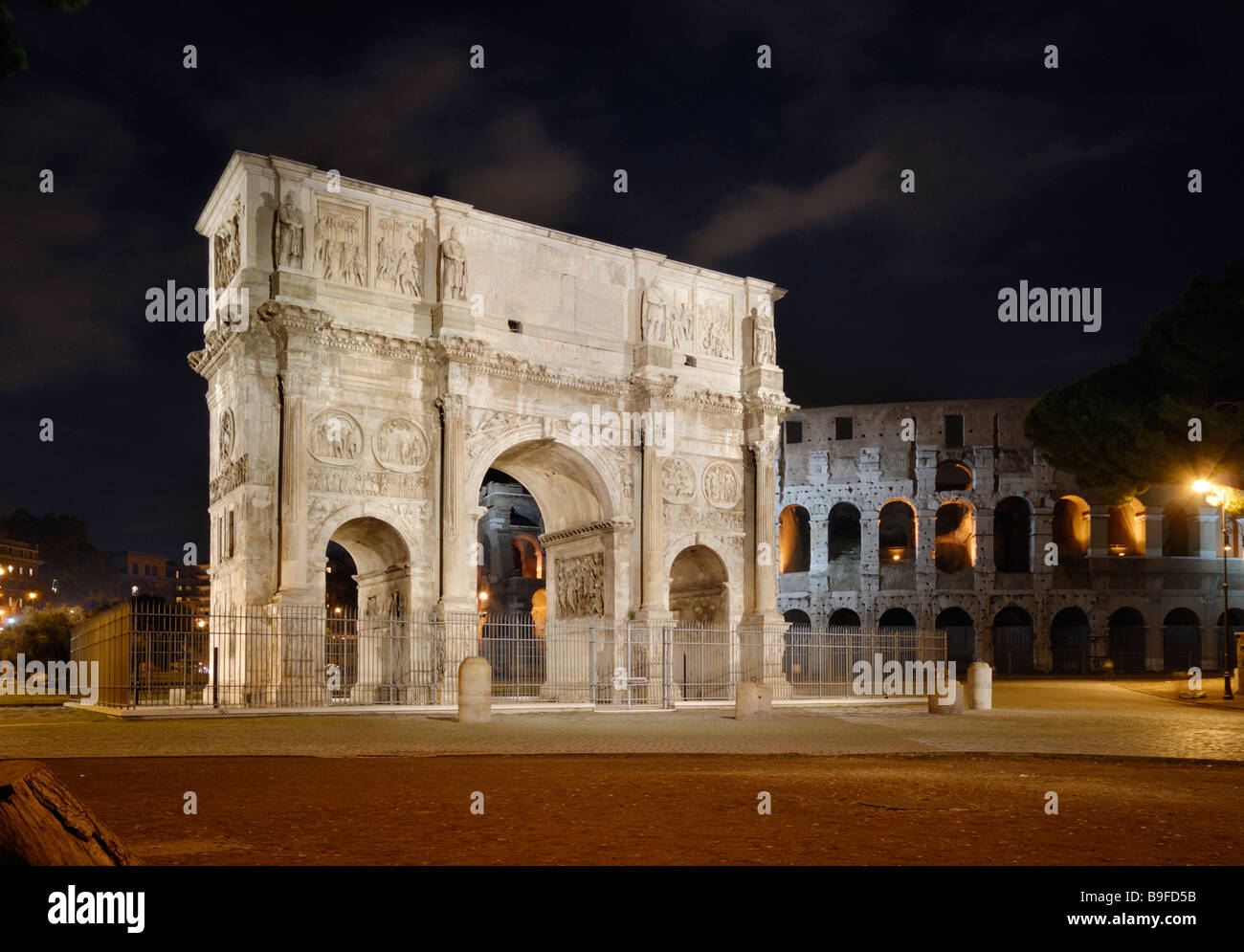 Triumphal arch lit up at night, Arch of Constantine, Rome, Latium, Italy Stock Photo
