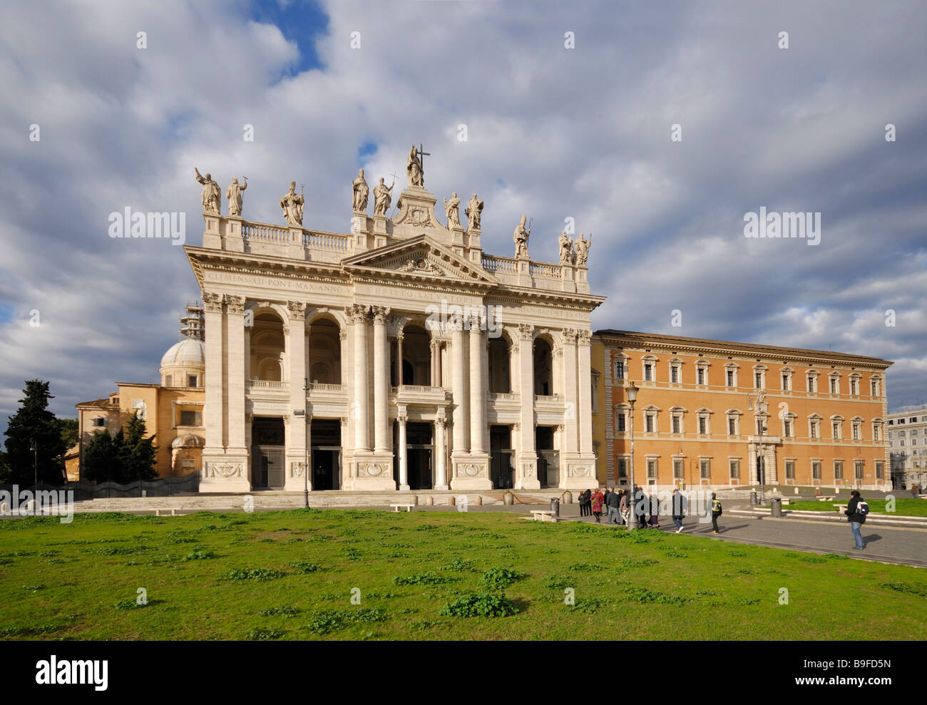 Tourists in front of basilica, St. John Lateran Basilica, Rome, Latium, Italy Stock Photo