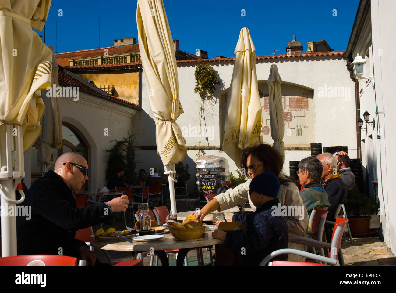 Family eating and drinking at St Herbert restaurant and brewery at