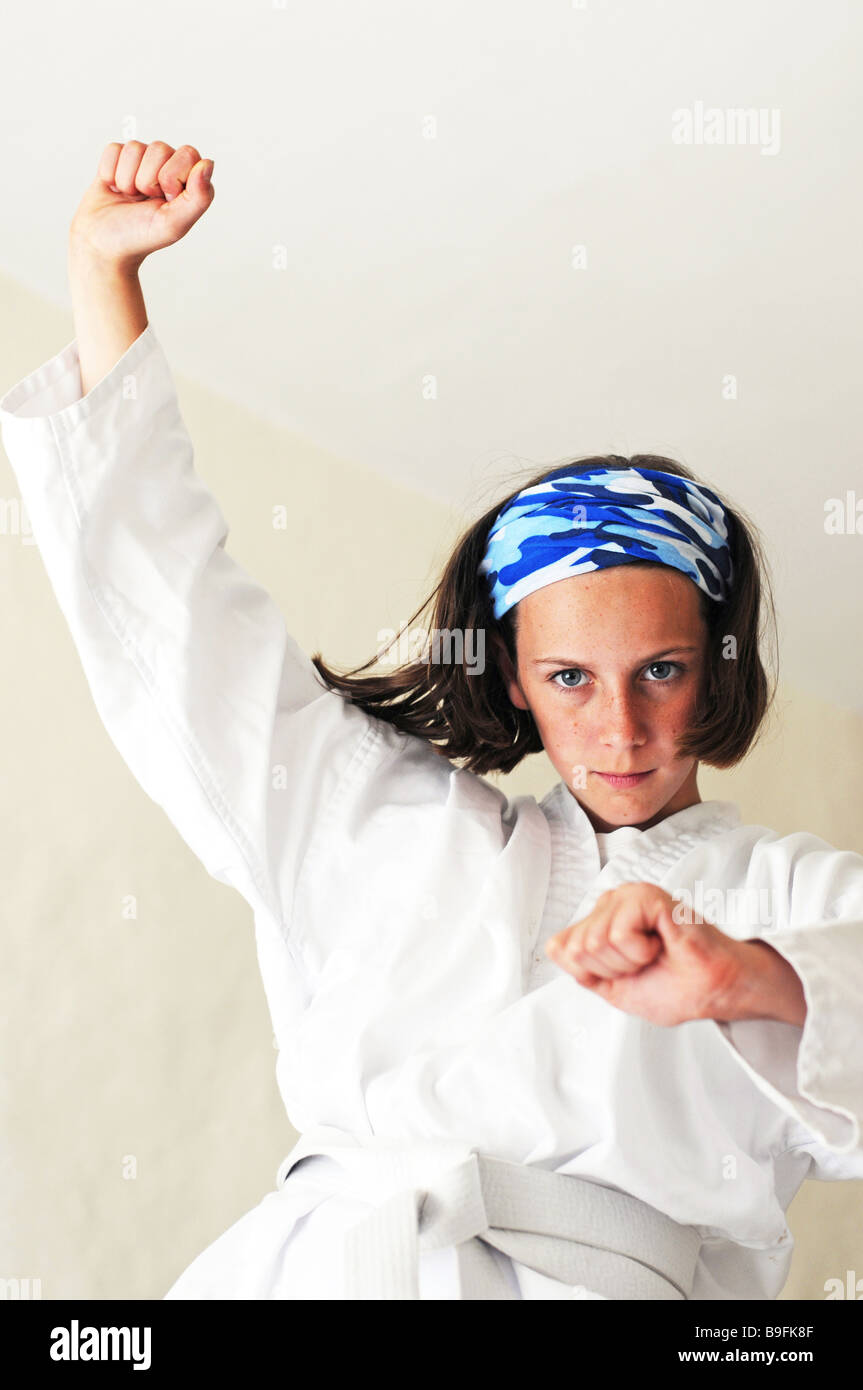 indoor portrait of girl doing martial arts Stock Photo