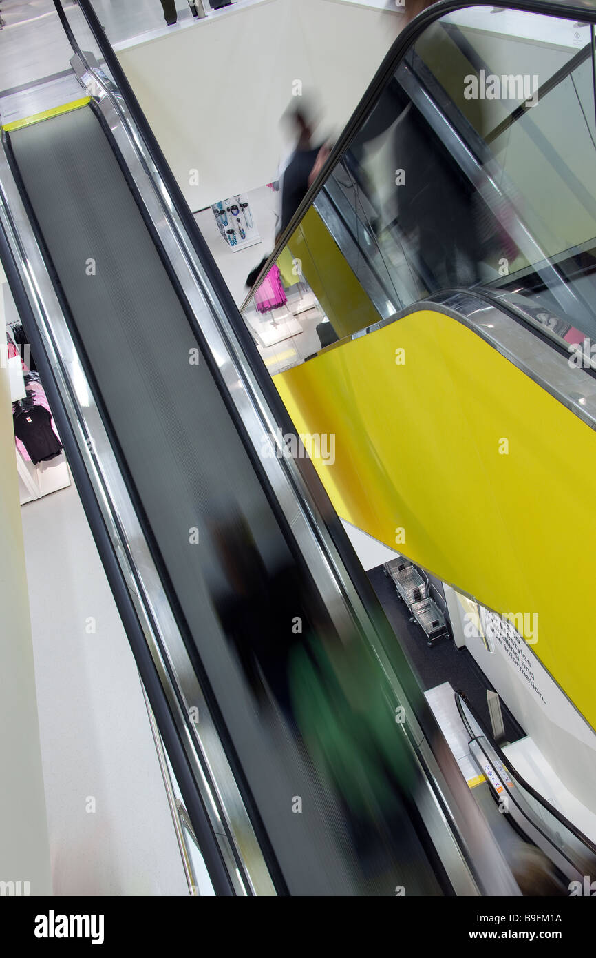 Escalators in a retail shop escalator shopping Stock Photo