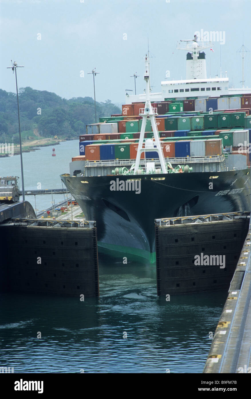 Container ship entering Gatun locks, Panama Canal Stock Photo