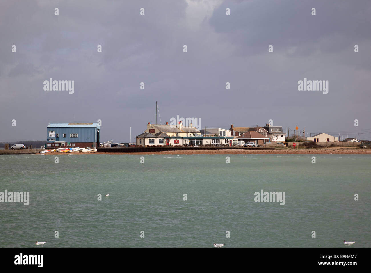 A view of Langstone harbour towards Hayling Island from Eastney with a