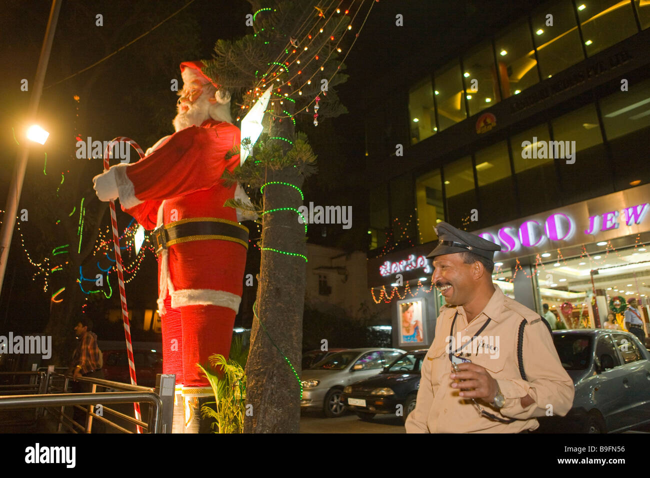 India Bangaluru Bangalore Santa Klaus store decoration Stock Photo