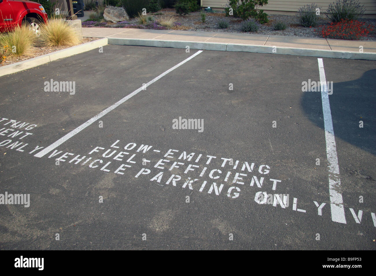 Parking spots designated for Low Emitting Fuel Efficient cars at the GAIA Napa Valley Hotel, American Canyon, California. Stock Photo