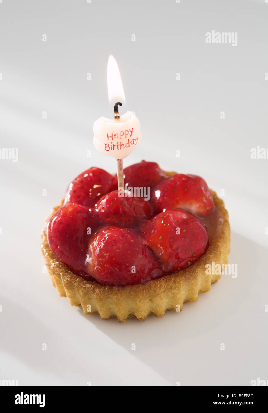 Birthdaytarts candle burn Stock Photo Alamy