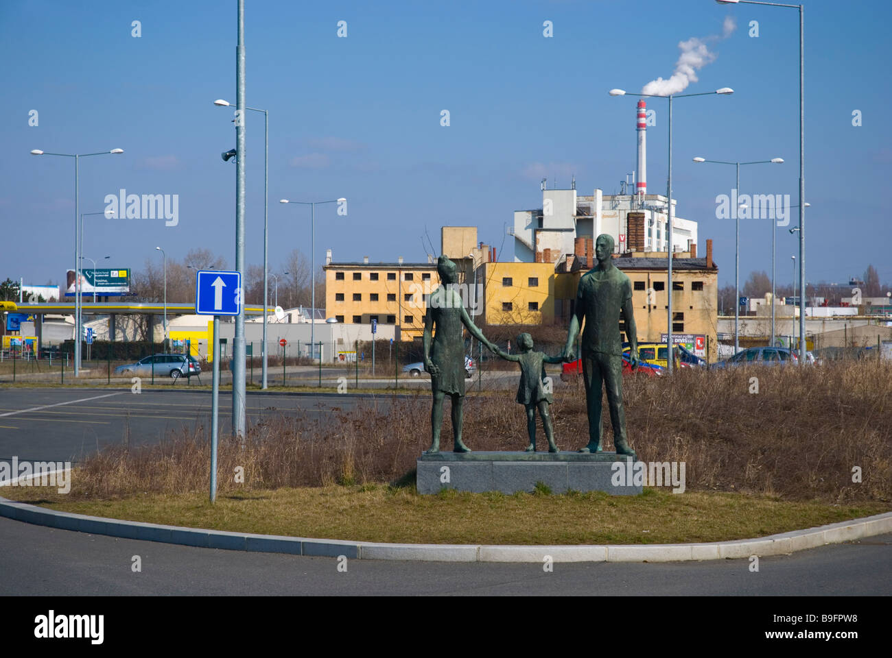 Statues and a factory at Depo Hostivar bus and metro station in outskirts of Prague Czech Republic Europe Stock Photo