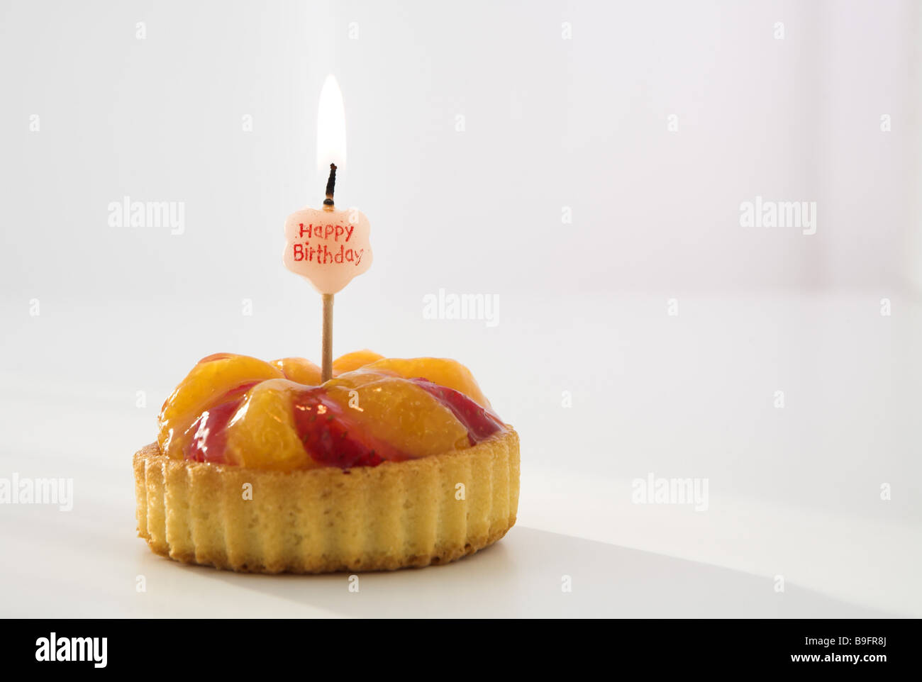 Birthdaytarts candle burn Stock Photo Alamy