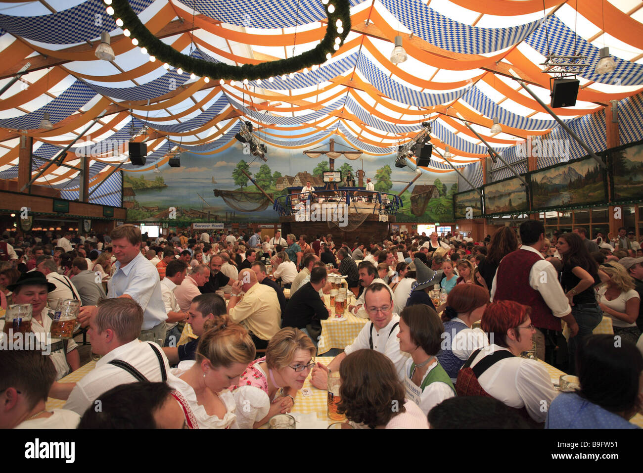 Germany Bavaria Munich Oktoberfest marquee Fischer-Vroni visitors interior Stock Photo