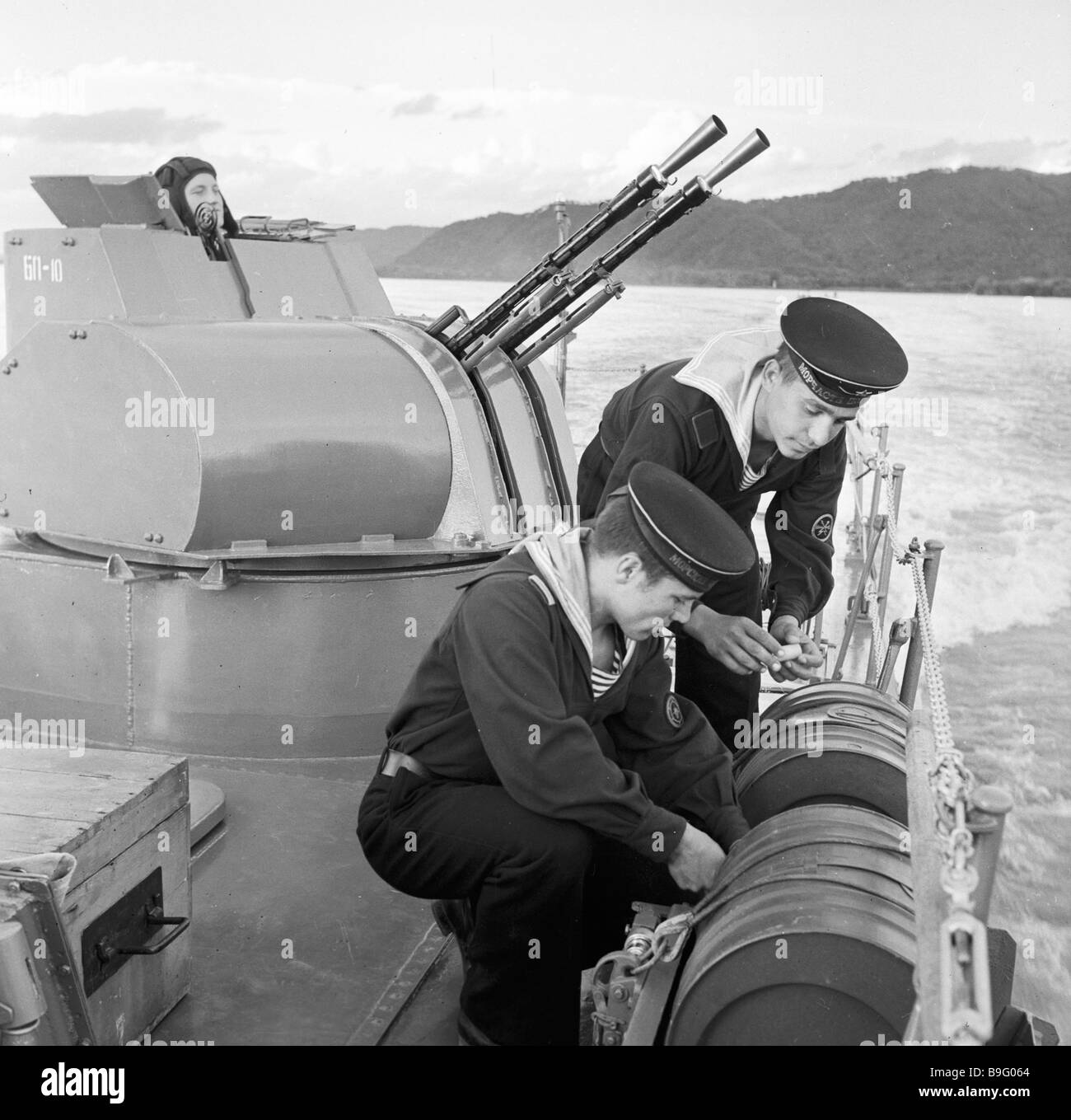 Naval border guards check their ship combat equipment Stock Photo Alamy