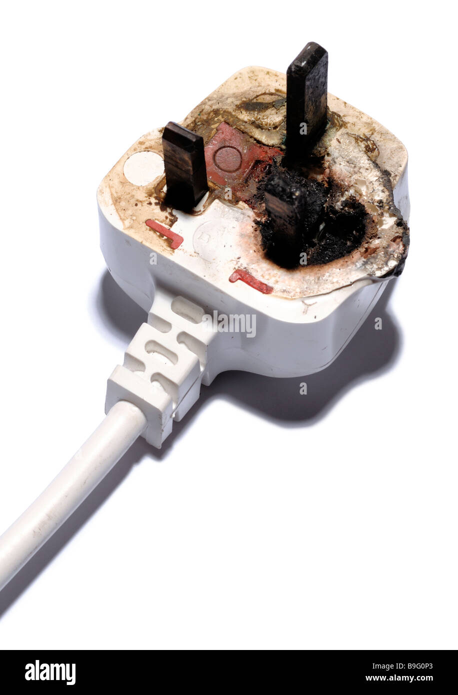 Burnt electrical plug Stock Photo