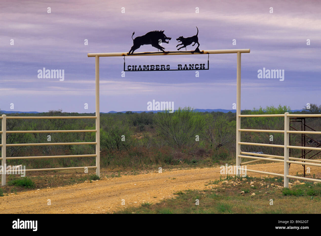 Wrought iron sign at ranch gate near D Hannis at US 90 highway in Medina County Texas USA Stock Photo
