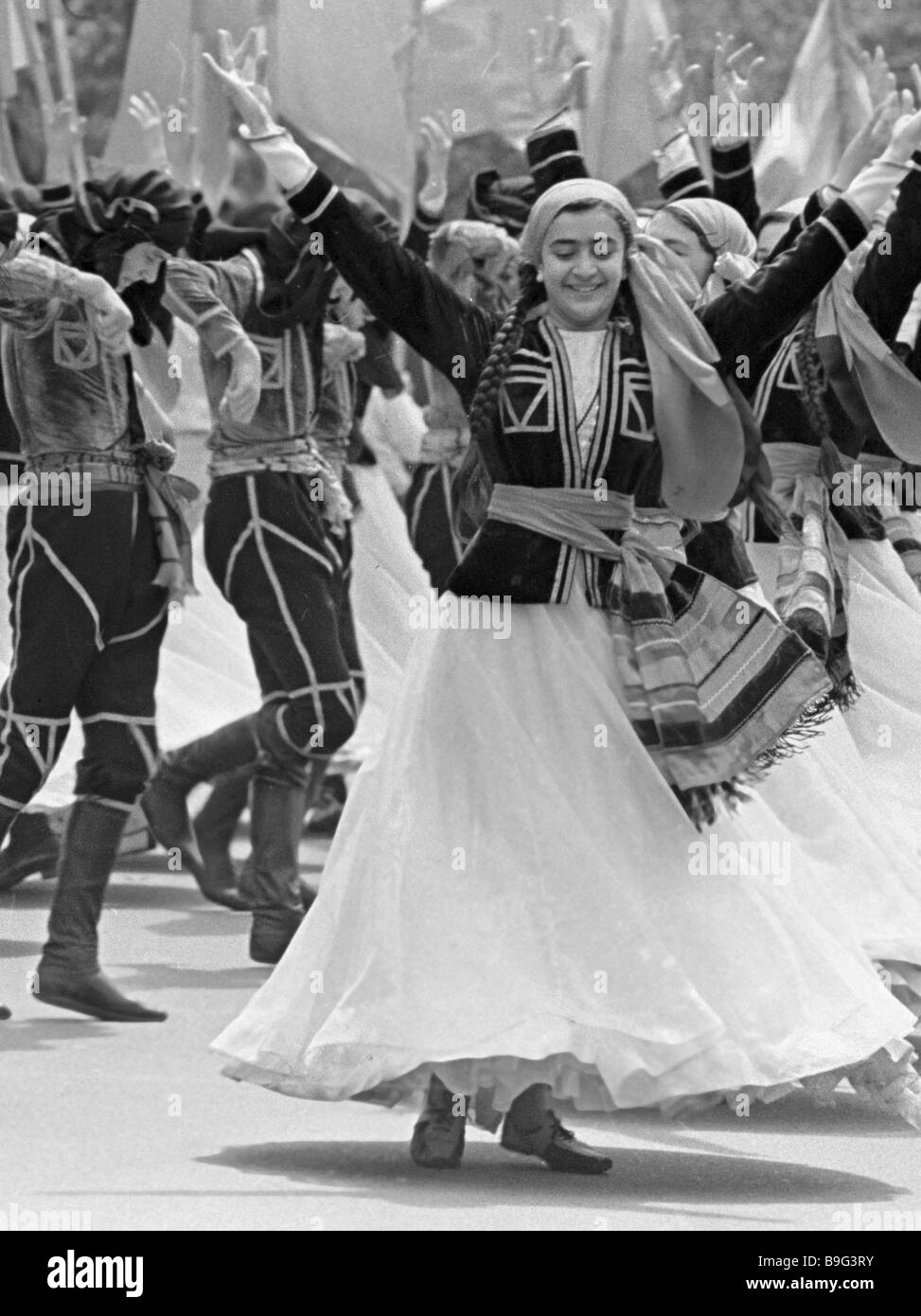 Folk dance company performing during May Day celebrations Stock Photo Alamy
