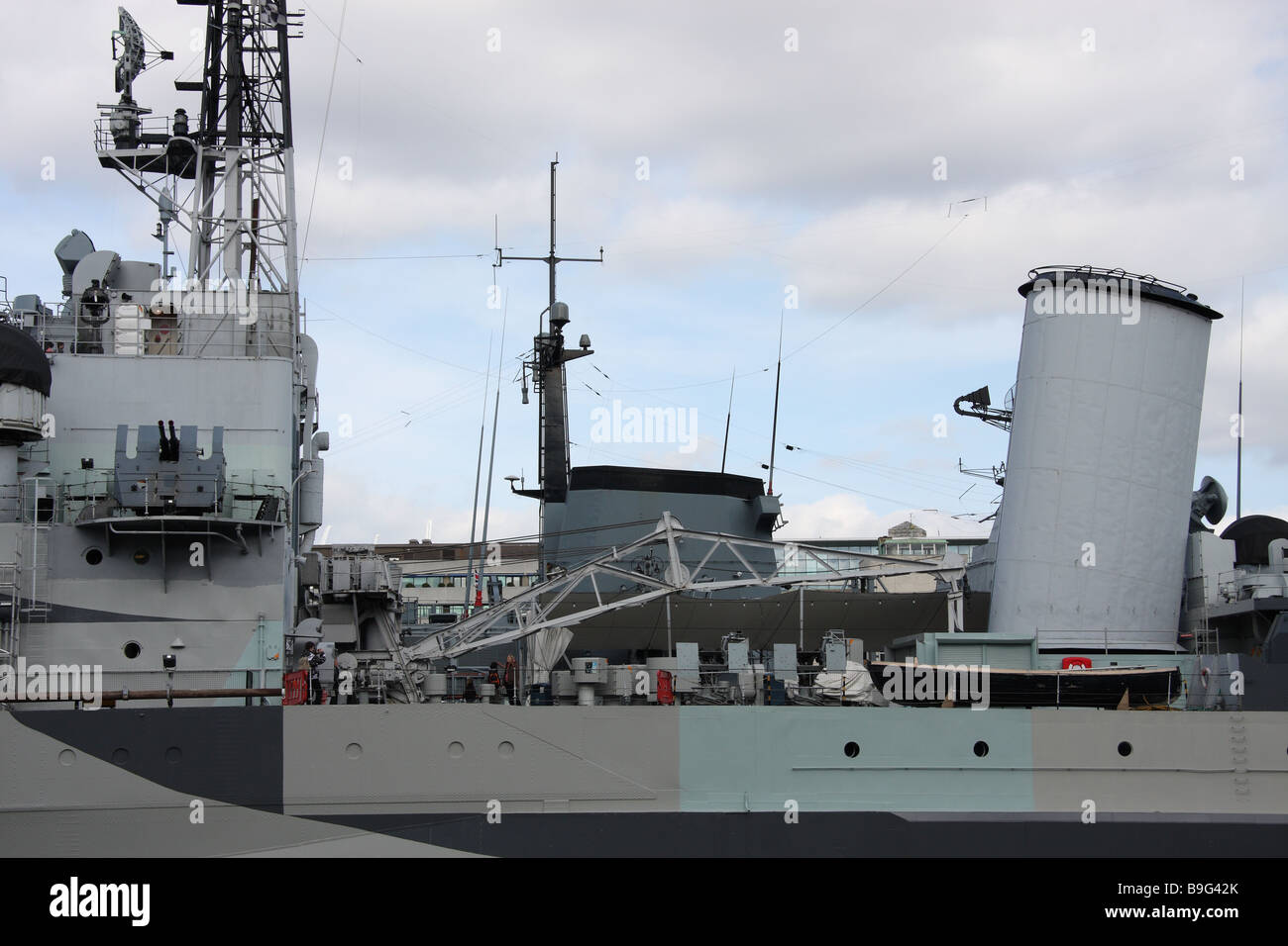 london england uk hms belfast warship ww2 funnel battleship navy naval tourist attraction Stock Photo