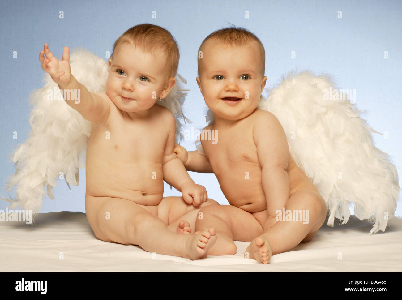 Babies two angel wings Stock Photo - Alamy Babies two angel wings Stock Photo - Alamy