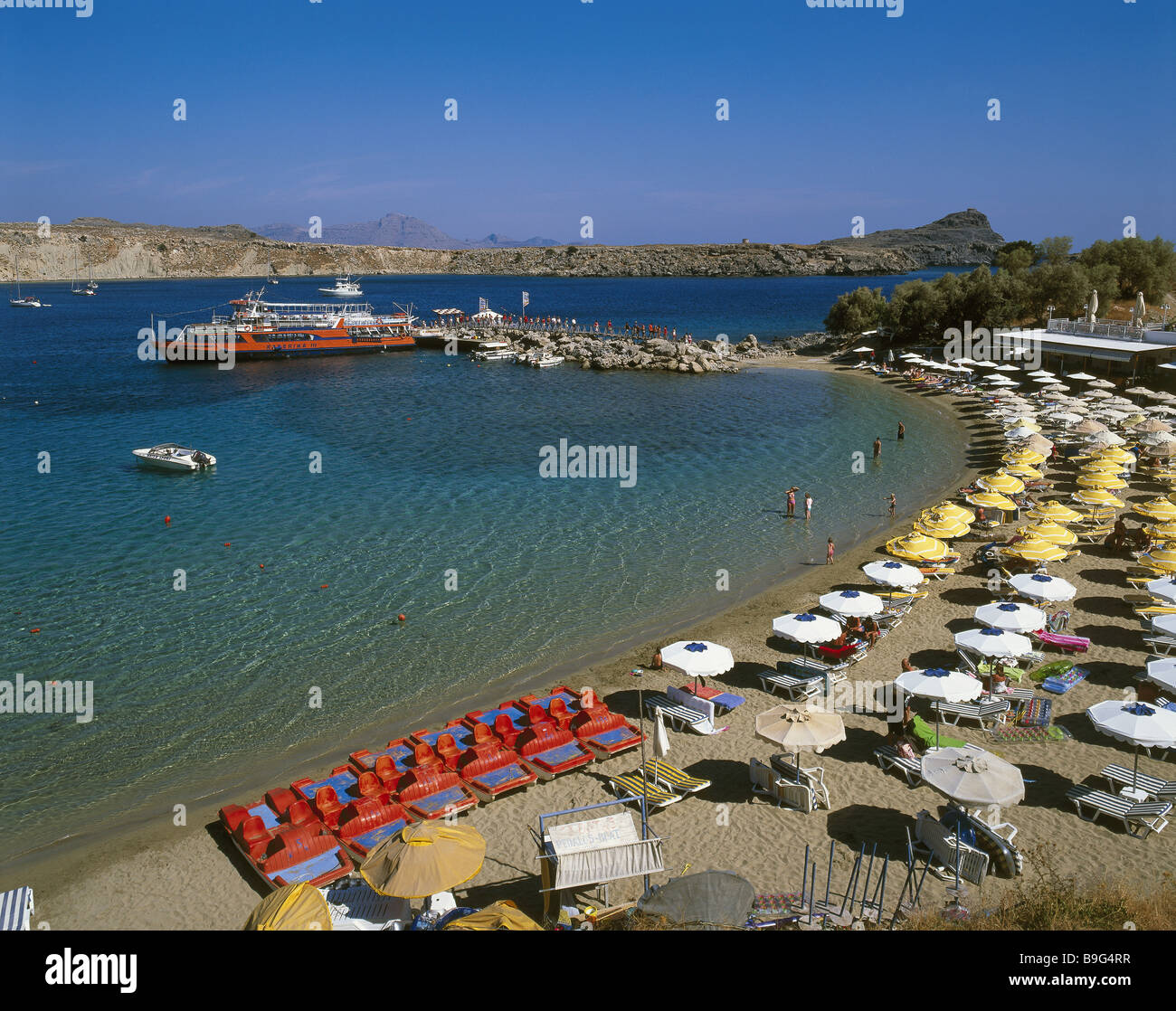 Greece Dodekanes island Rhodes coast Lindos beach Pallas Beach swimmers ...