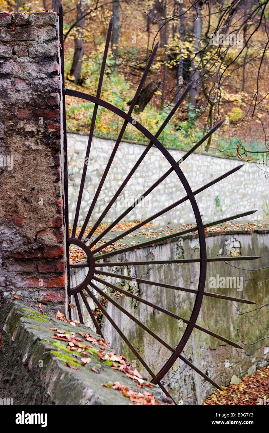 Radial spyked fence in autumn. Stock Photo