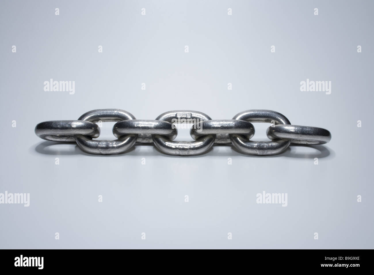 Metal-chain  chain  metal  iron-chain  iron  steel  chrome  limbs  chain-limbs  interrelated  connected  strongly  hard Stock Photo