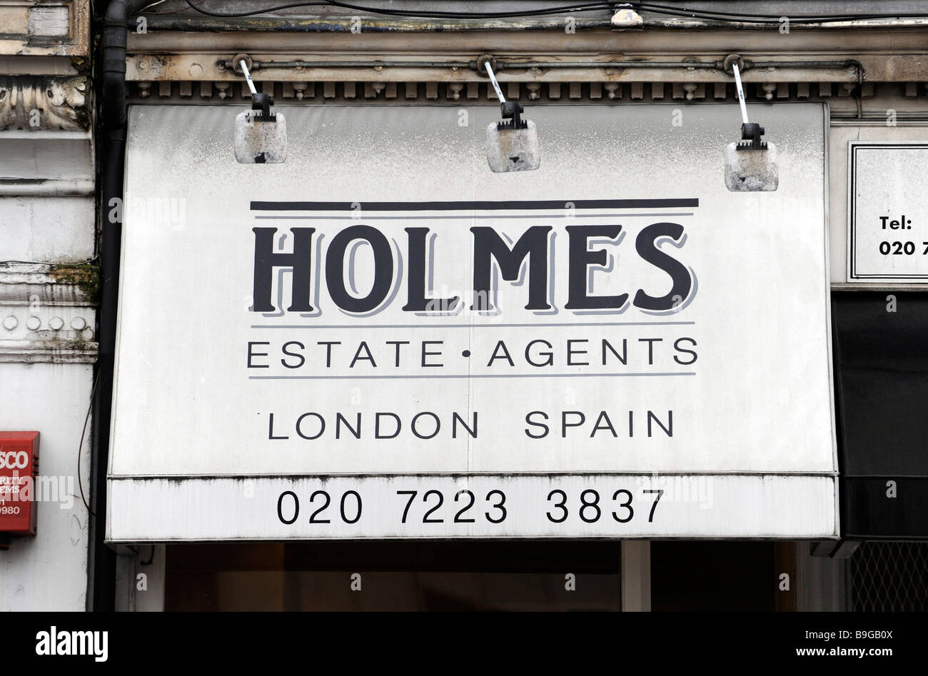 A sign for Holmes estate agents which handles properties in London and