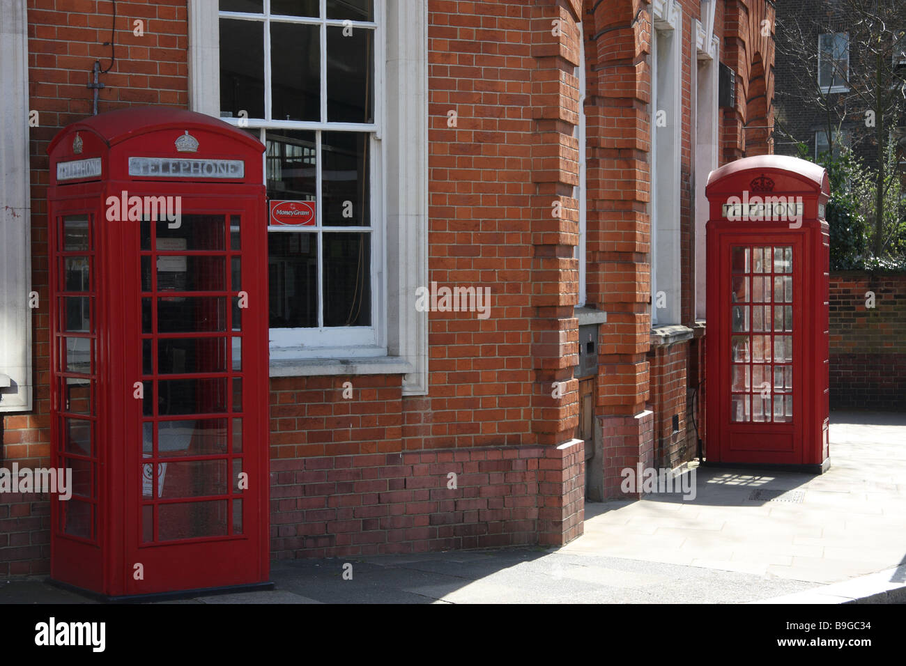 blackheath london england uk victorian post office red traditional telephone box booths Stock Photo