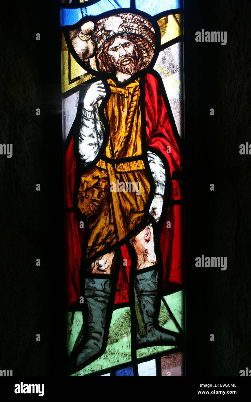 Stain glass window depicting San Roque Saint in San Roque’s Church in the North of Galicia, Spain Stock Photo