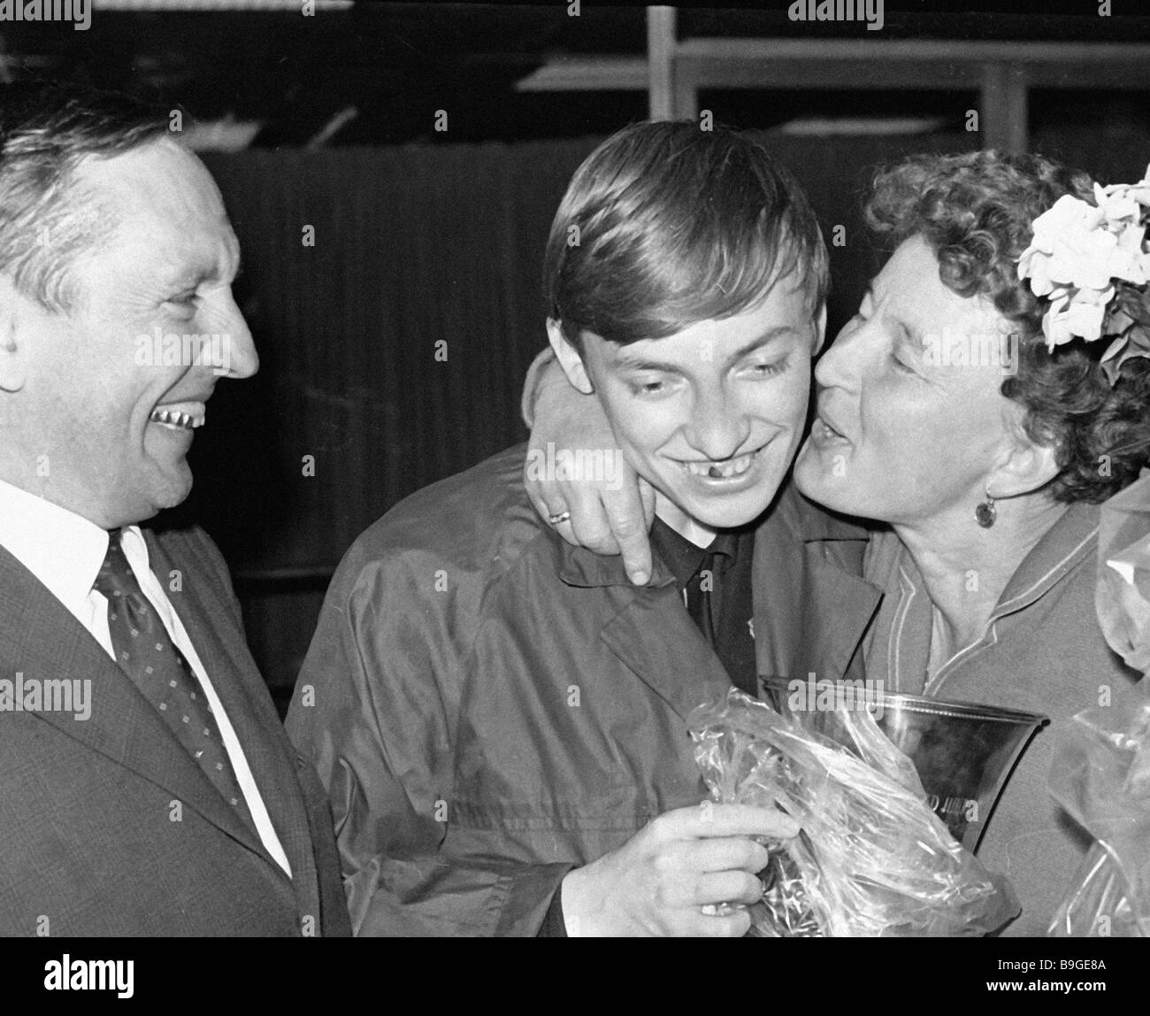 World chess champion Anatoly Karpov center with his mother Nina