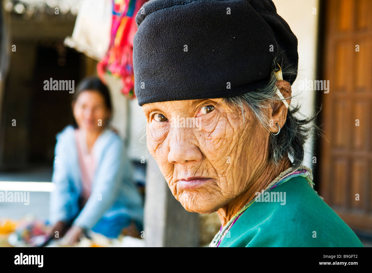 Portrait of an old woman taken in a small village in North Thailand ...