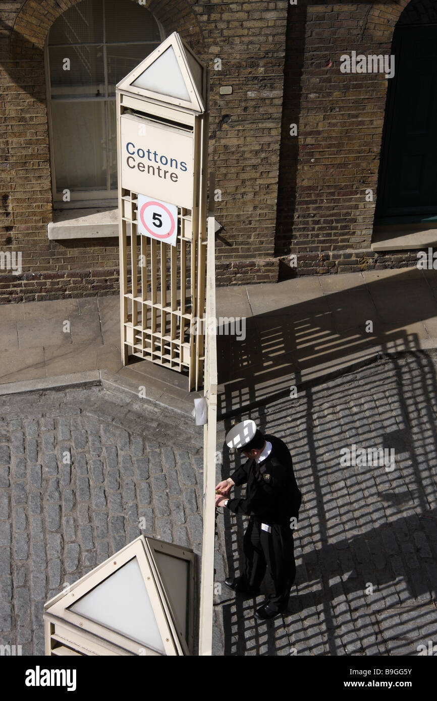london england uk security guard modern old building architecture