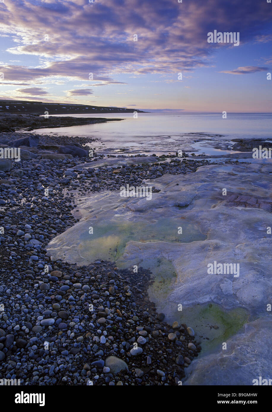 Norway Finnmark Vadso coast evening-mood Scandinavia North-Norway Varanger-Peninsula coast-region rock-coast beach stones Stock Photo