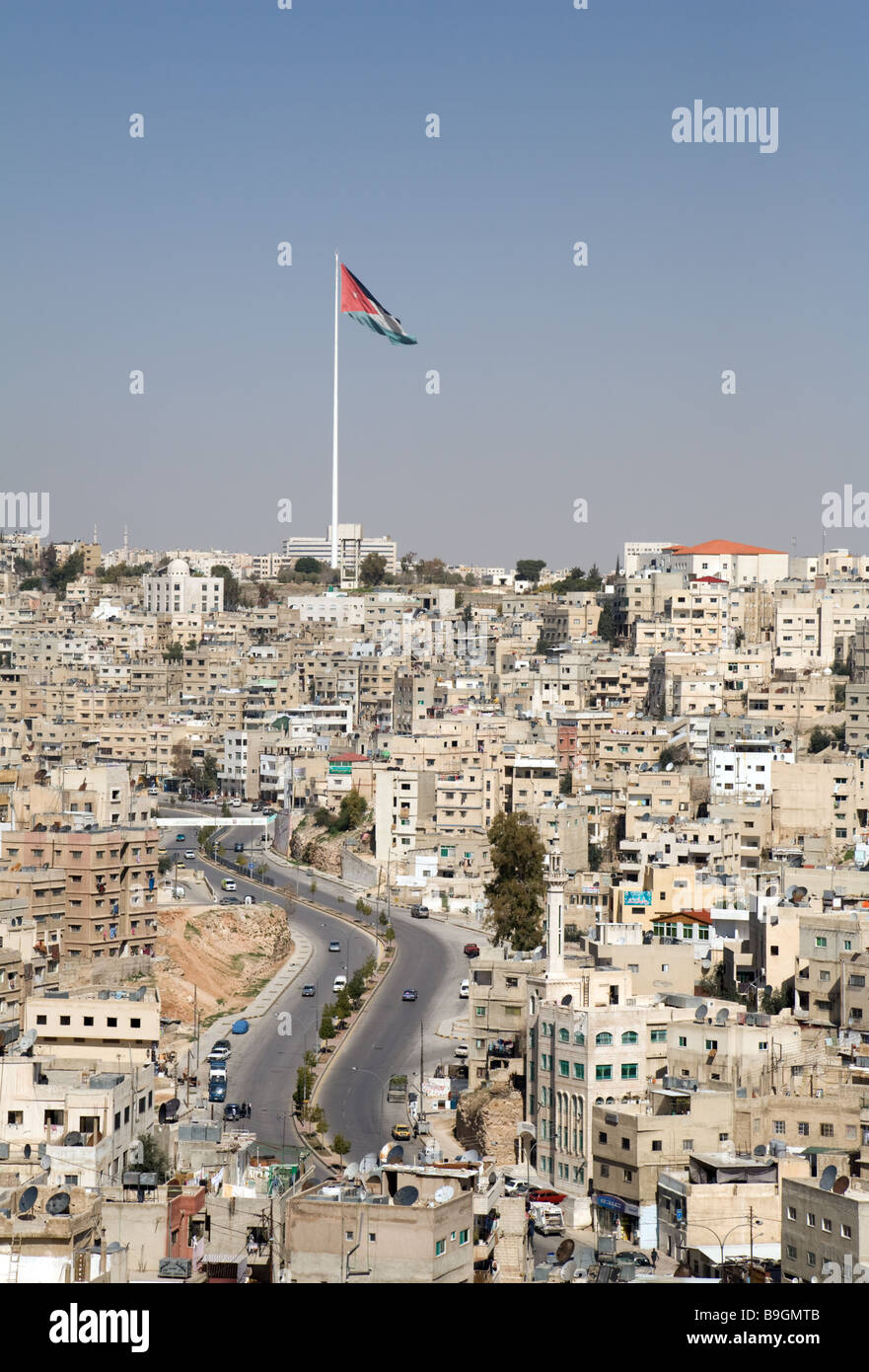 The city of Amman with the Jordanian flag flying; Jordan Stock Photo