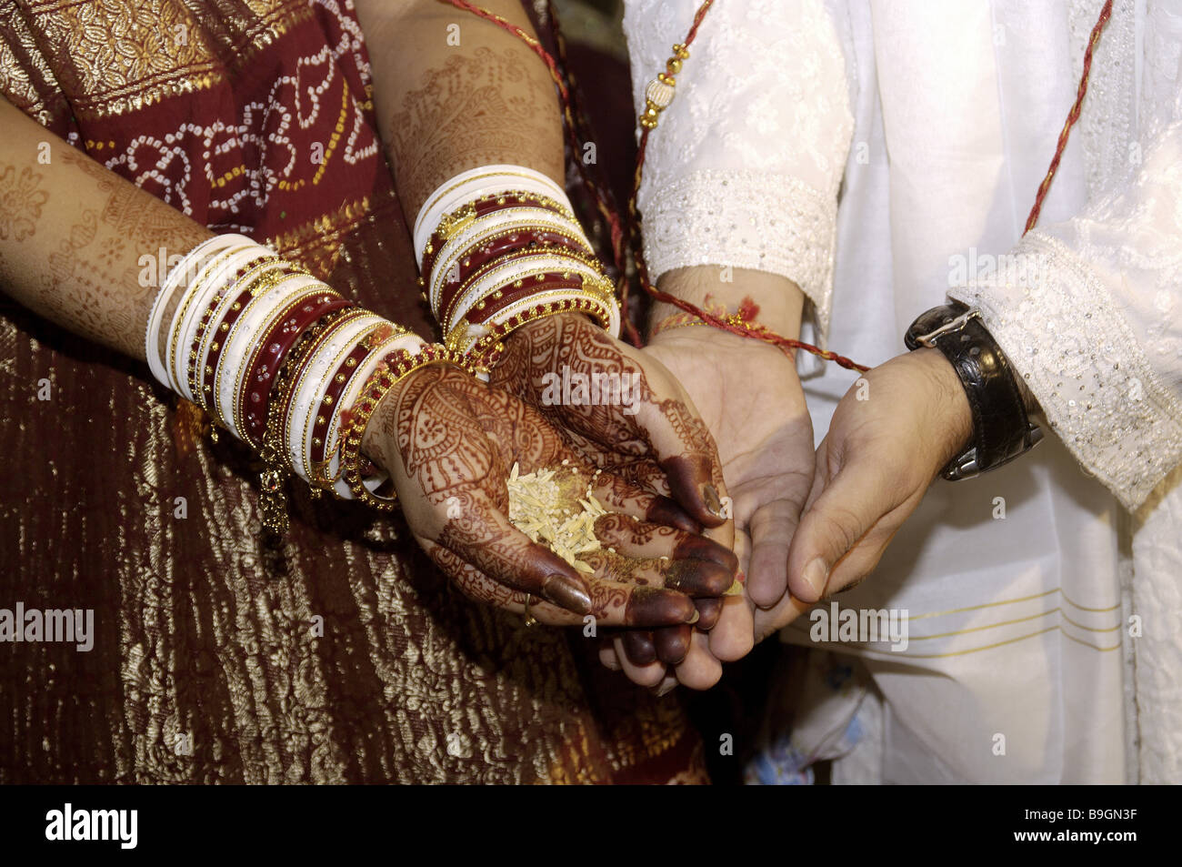 Bridal couple Indian detail hands henna-painting bracelets ritual series wedding tradition tradition India people pair skin Stock Photo