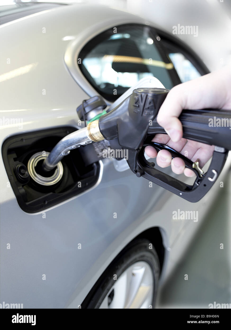 fuel nozzle  car  fill up Stock Photo