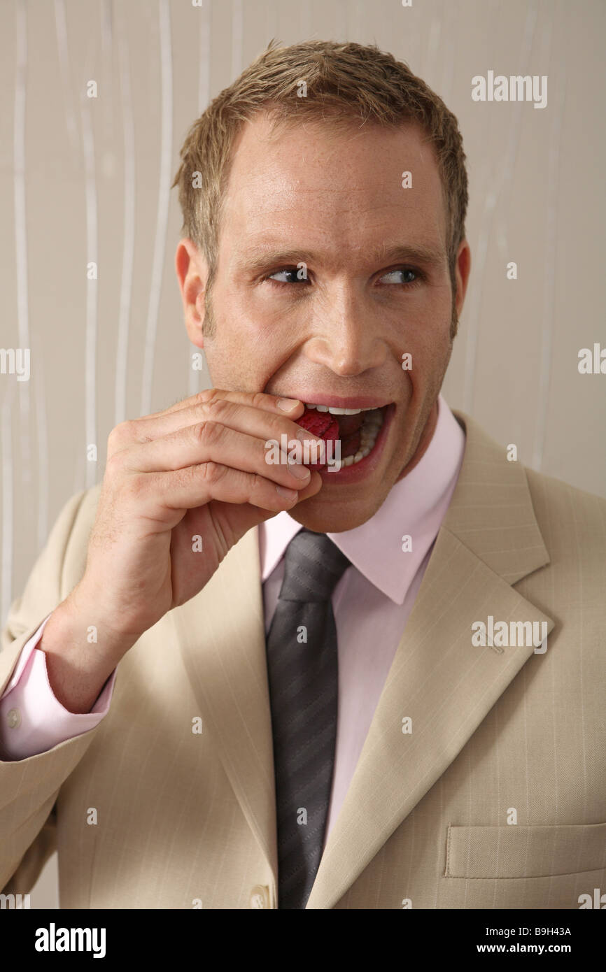 businessman walnut teeth opens portrait Stock Photo