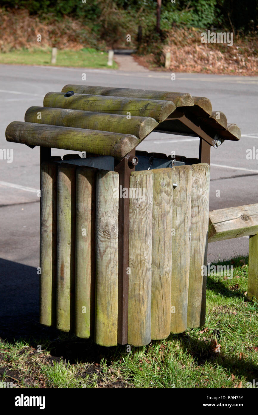 A rubbish bin made using tree logs in a countryside car park, Surrey