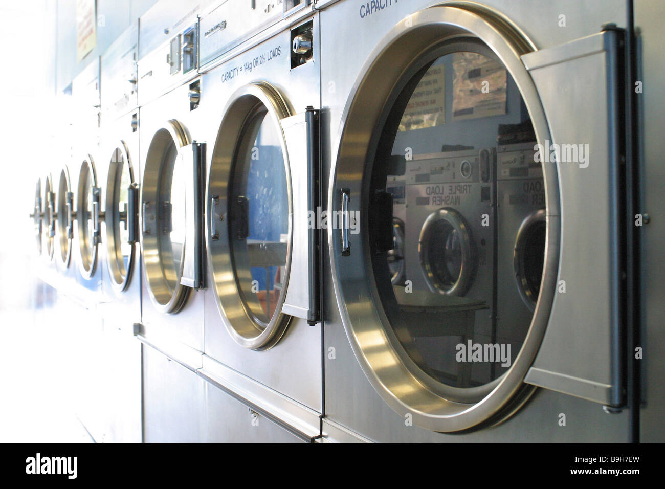 Laundromat washing machines Stock Photo Alamy