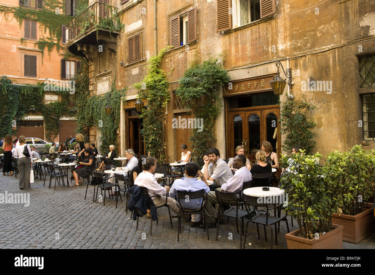 Italy Rome via della Pace cafe guests Stock Photo Alamy