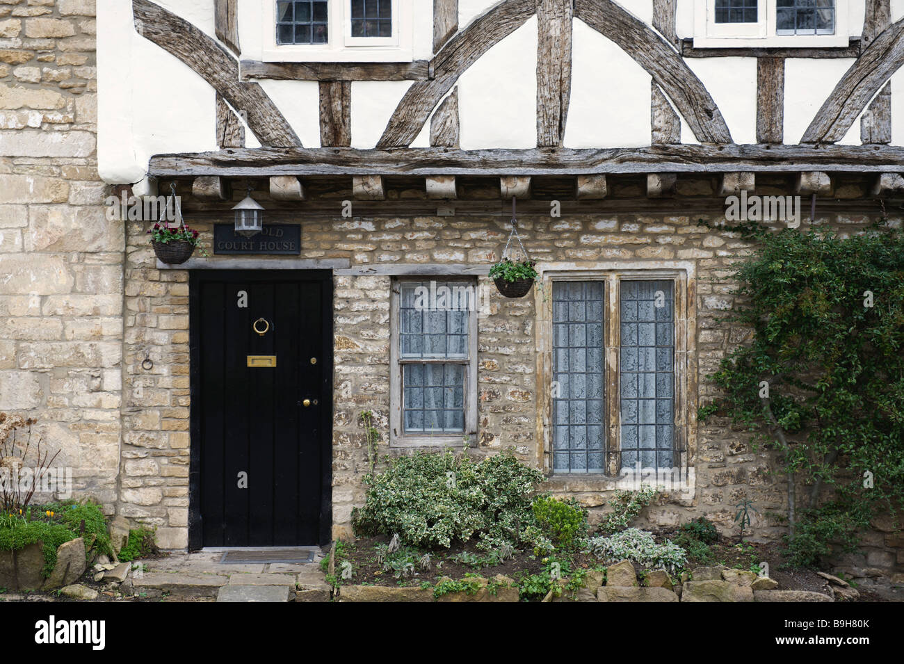 Study of tudor house front Castle Coombe Wiltshire Stock Photo