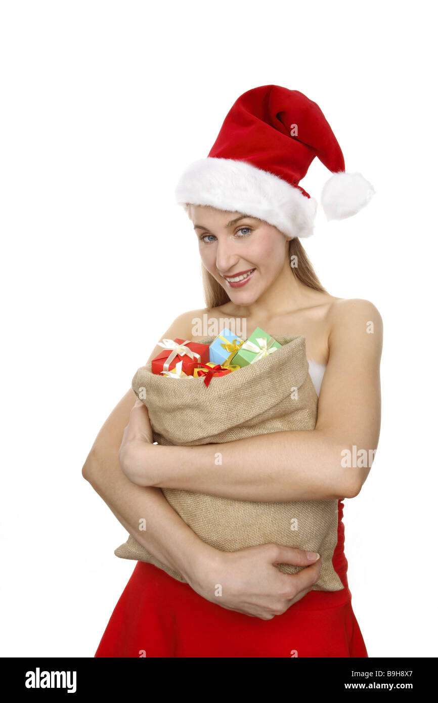 Christmas-woman sack gifts carry smiling series people woman disguise outfit Santa Claus costume christmassy Christmas time Stock Photo