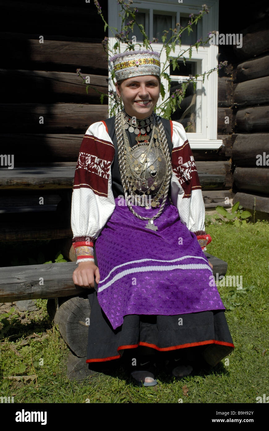 Estonia wood-house Setu-Stamm woman people-official dress Baltikum southeast-Estonia Setumaa people natives Setu Setufrau Stock Photo