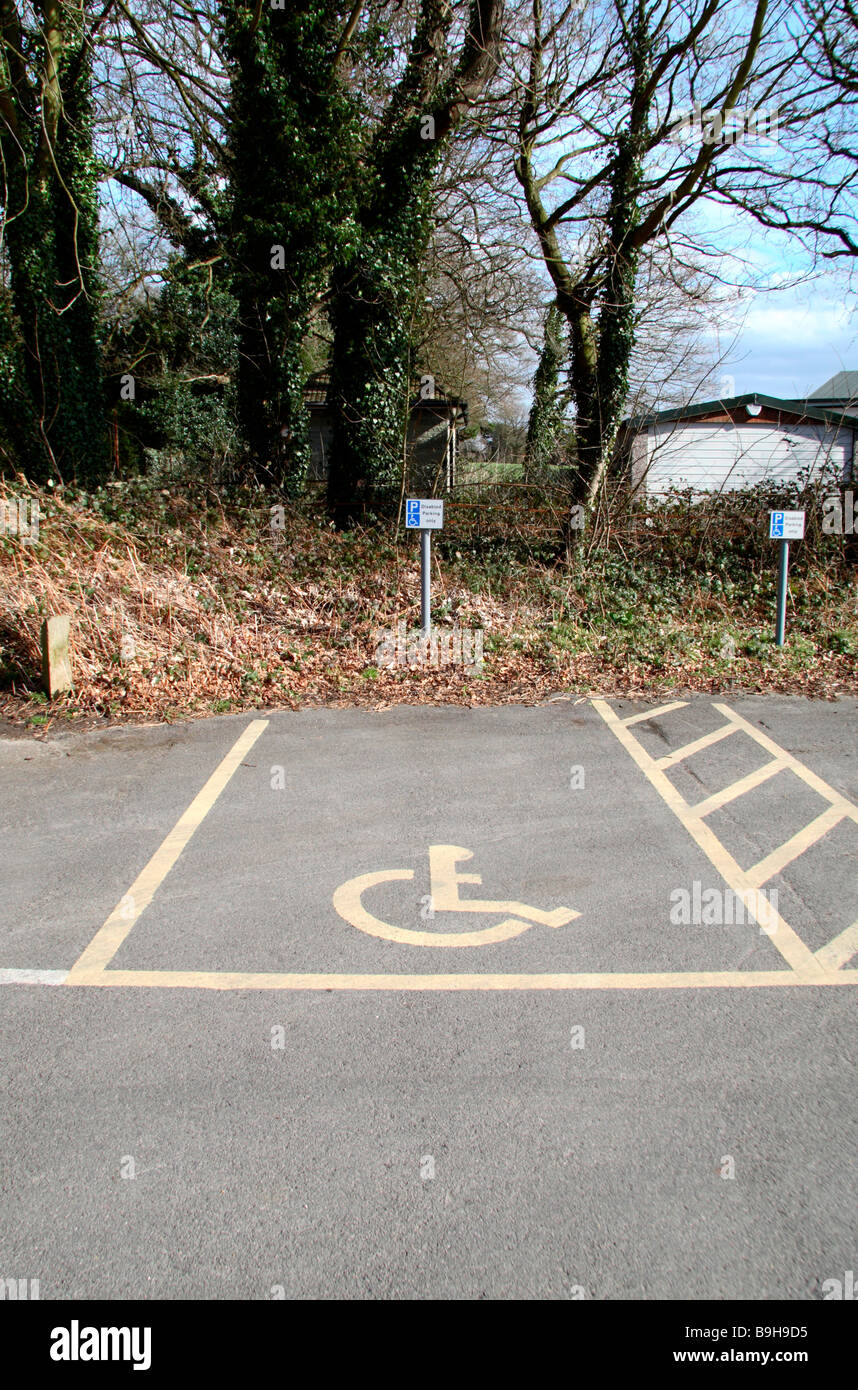A special car parking space for disabled drivers in a countryside car