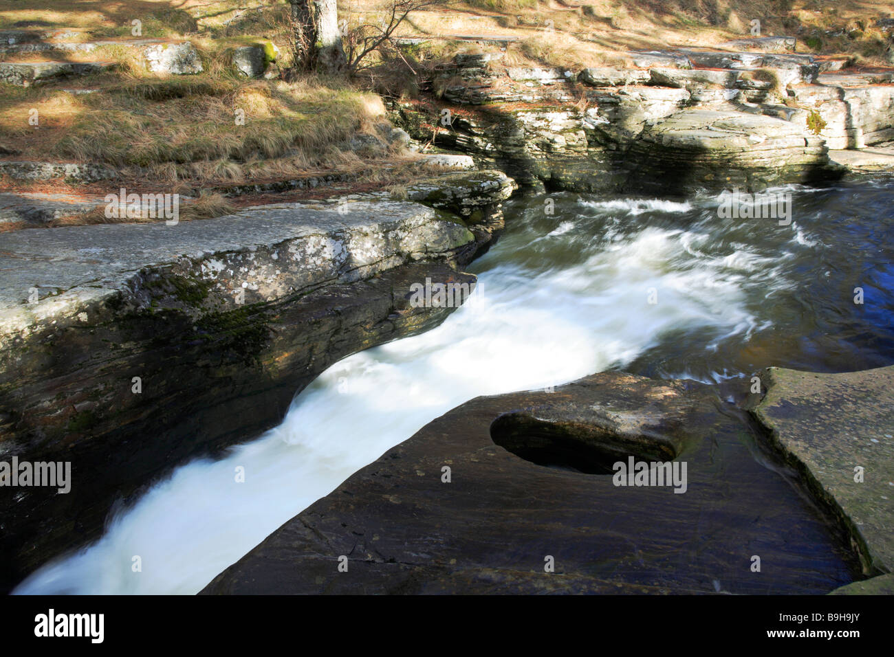 Quoich Water flowing through narrow past the Punch Bowl at the