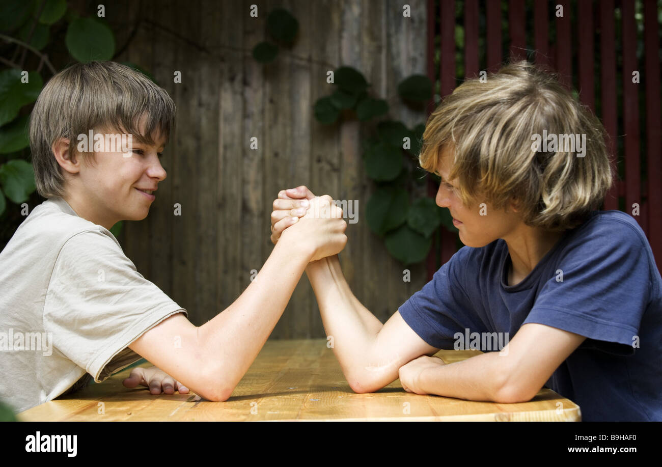 Boy arm wrestling Stock Photo Alamy