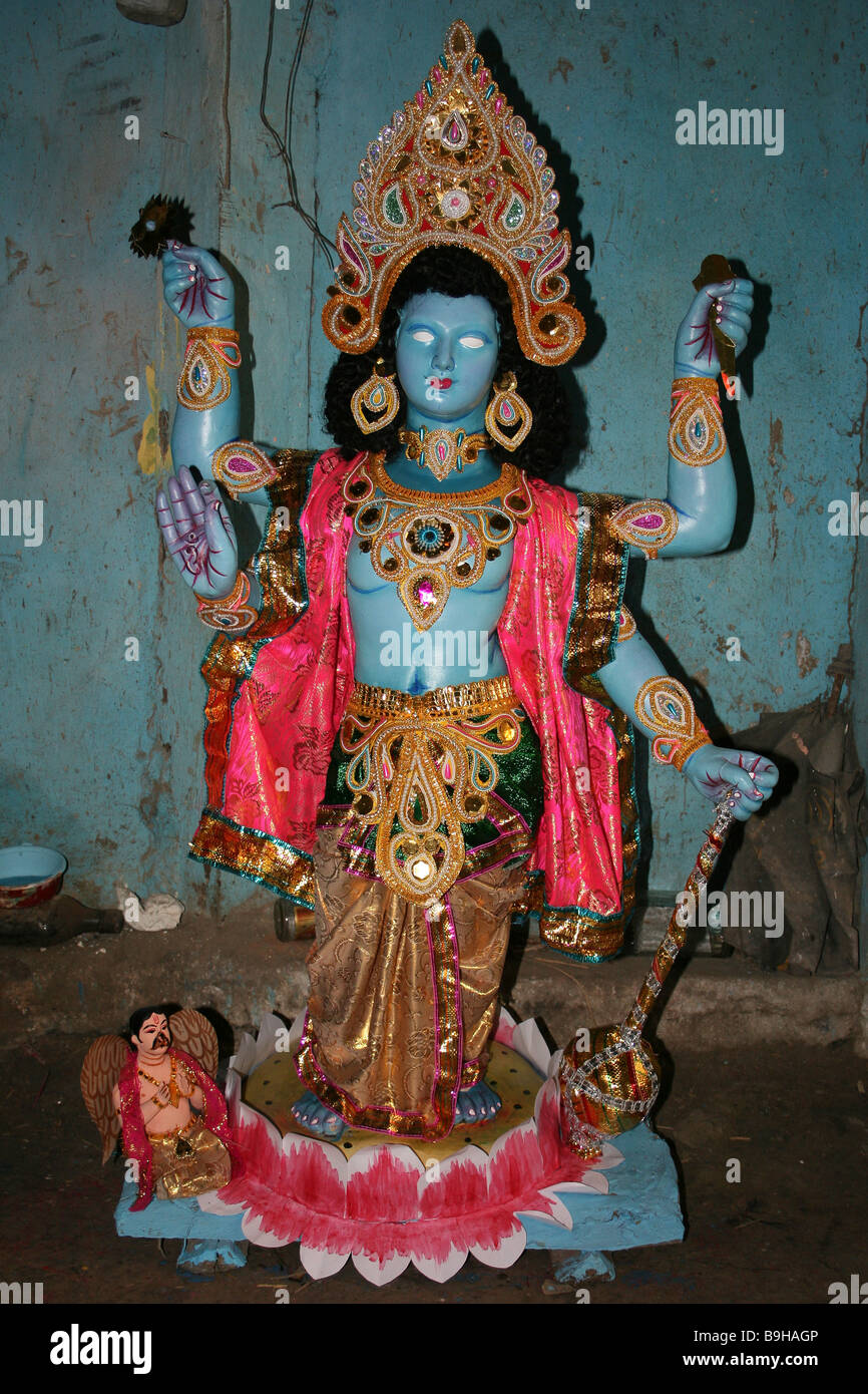 Painted Statue of Hindu God Vishnu in the Potters Market, Kumortuli, Kolkata Stock Photo