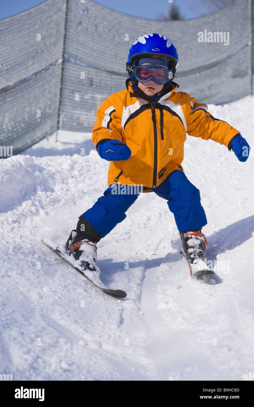 boy small skiing snow plow Stock Photo Alamy