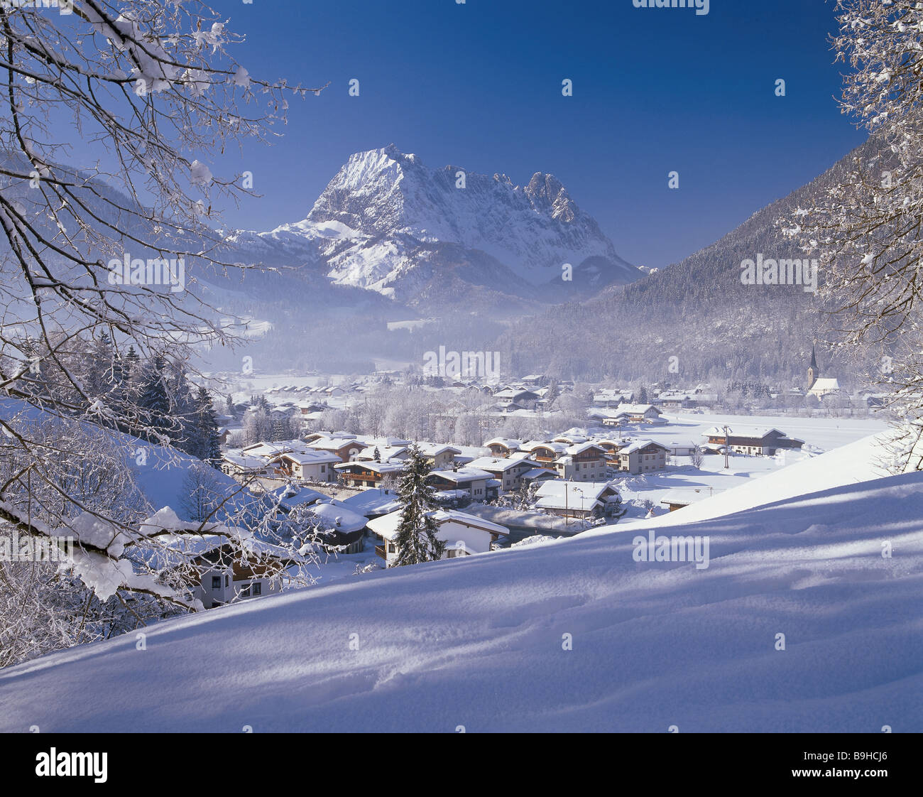 Austria Tyrol Kirchdorf place-overview winter North-Tyrol mountain scenery mountain-village place houses residences Stock Photo