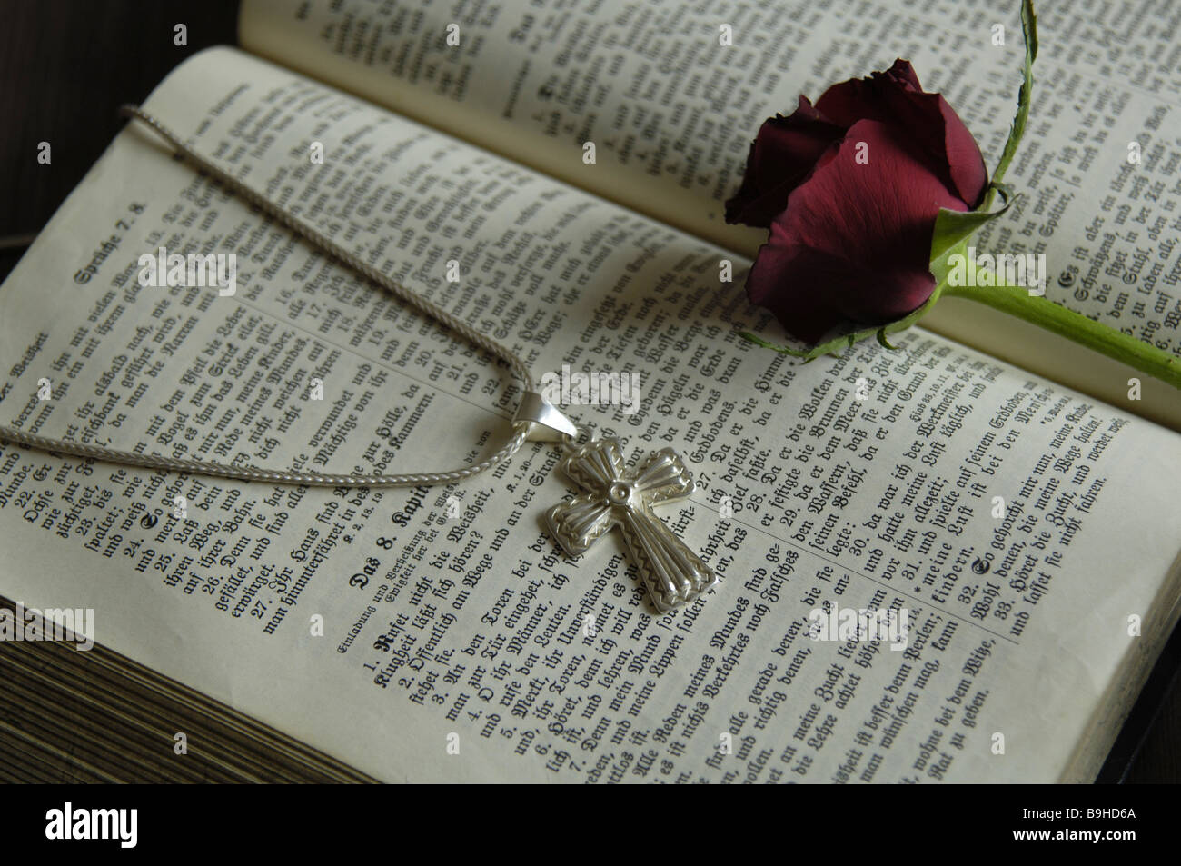 Bible hit silver-chain cross rose-bloom series prayer-book old antique  use-spoors symbol belief religion Catholicism Stock Photo - Alamy