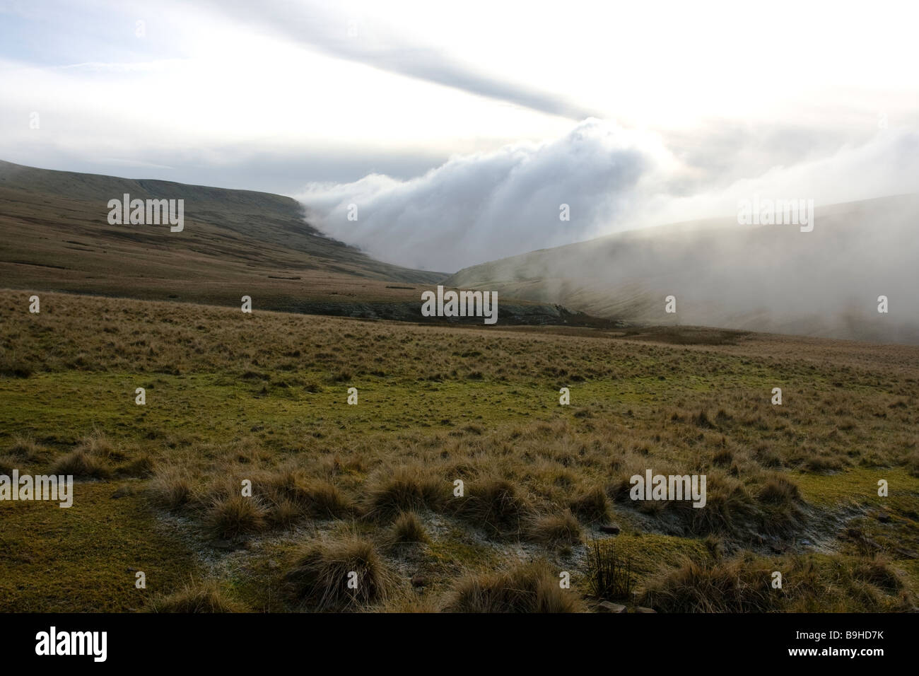 Cloud inversion on the fields below Pen Y Fan Stock Photo - Alamy