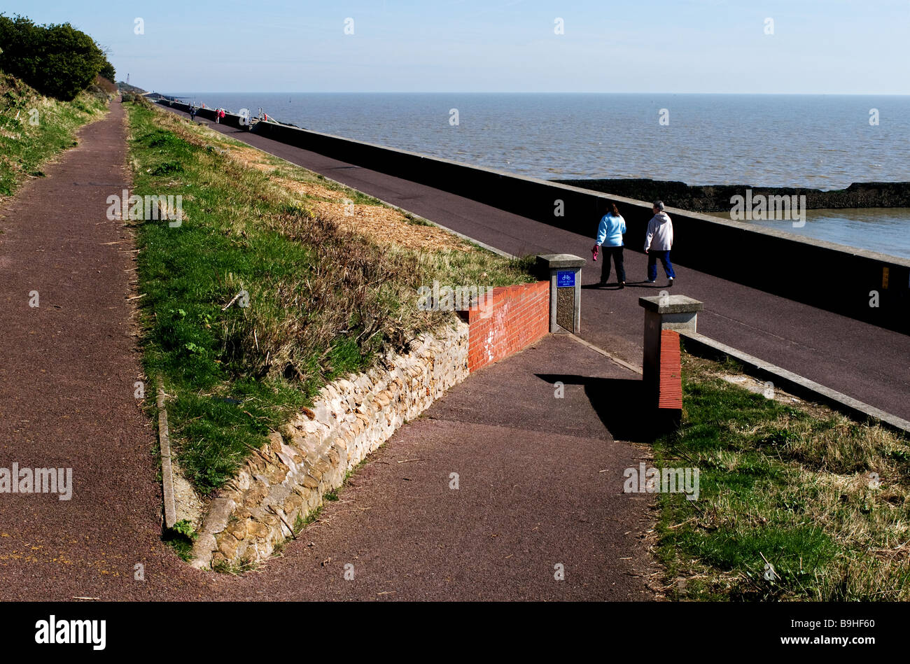 Friends walking along promenade hi-res stock photography and images - Alamy